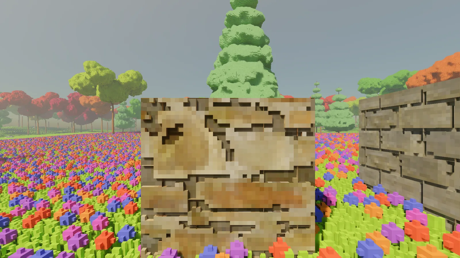 A fieldstone wall with joints one voxel deep, the stones reading mostly as a flat pattern.