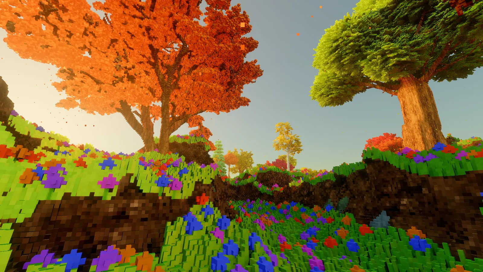 Two large trees, one orange and one green, leaning over a flowery bank under a blue sky.