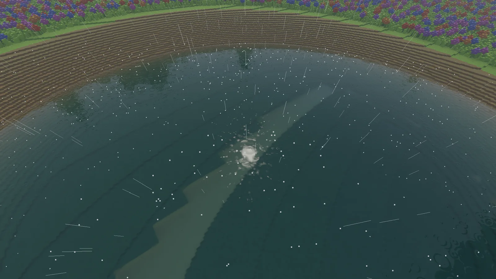 The pond in rain, its surface dotted with small white splashes and rings, with streaks of rain falling through the frame.